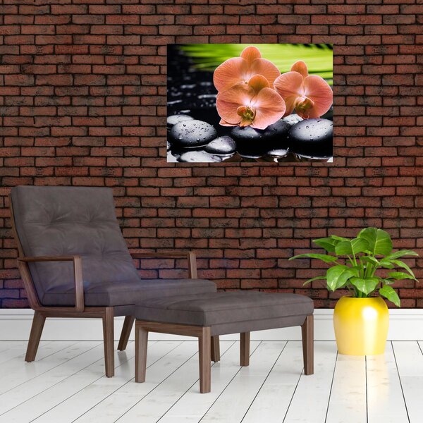 Obraz - Oranžová orchidej s palmovými listy (70x50 cm)