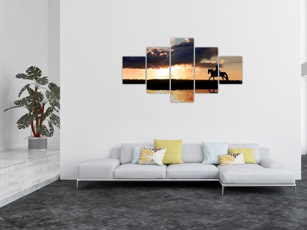 Obraz - Jezdec na koni při západu slunce (125x70 cm)