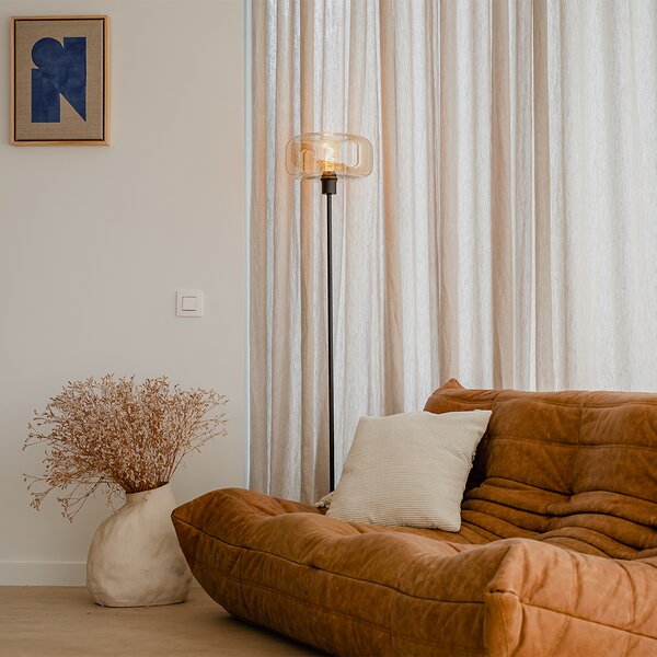 Stojací lampa v art deco stylu černá s jantarovým sklem - Bizle