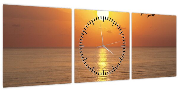 Obraz - Západ slunce nad oceánem (s hodinami) (90x30 cm)