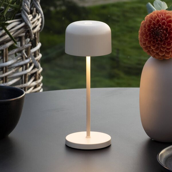 Konstsmide LED stolní lampa Lille na baterie, výška 20 cm, písková barva, IP54, USB, stmívatelný, Krémová / jantar, Obývací pokoj / jídelna, Hliník, Moderní