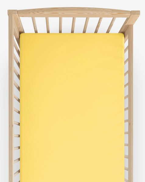 Goldea bavlněné prostěradlo do dětské postýlky - žluté 70 x 140 cm