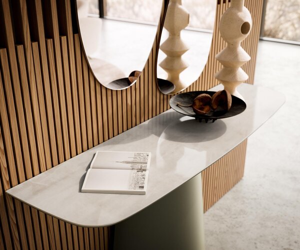 DELIFE Konzolový stůl Edge oválný 140×40 cm keramika onyx champagne Conos kov titanová barva