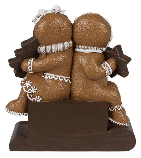 Hnědá vánoční dekorace Perníček sedící na kalendáři se stromečkem a hvězdou – 11x4x13 cm