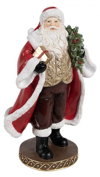 Červená vánoční dekorace Santa Claus na hnědém podstavci držící dárek a vánoční bobule – 23 cm