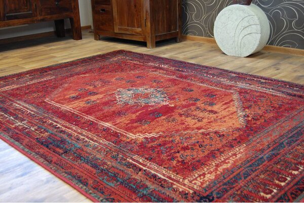 Kusový koberec vlněný Dywilan Omega Mistik Red Červený Rozměr: 66x100 cm