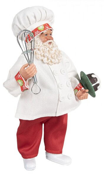 Bílá vánoční dekorace Santa Claus s kuchařskou čepicí držící dortík s polevou s metličkou – 27 cm