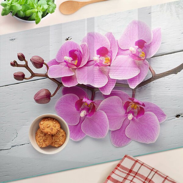 Skleněná deska do kuchyně Orchideje na bílém pozadí ddk-nr-wm-00006245