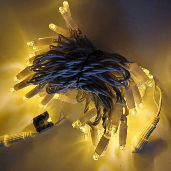 DECOLED Eco fix LED světelný řetěz 10 m, 60 zářivějších diod, teple bílá, 36V, bílý kabel, IP44