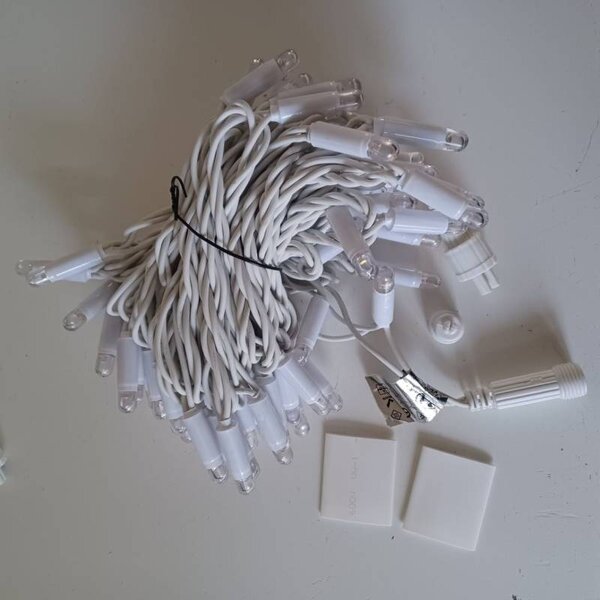DECOLED Eco fix LED světelný řetěz 10 m, 60 zářivějších diod, teple bílá, 36V, bílý kabel, IP44
