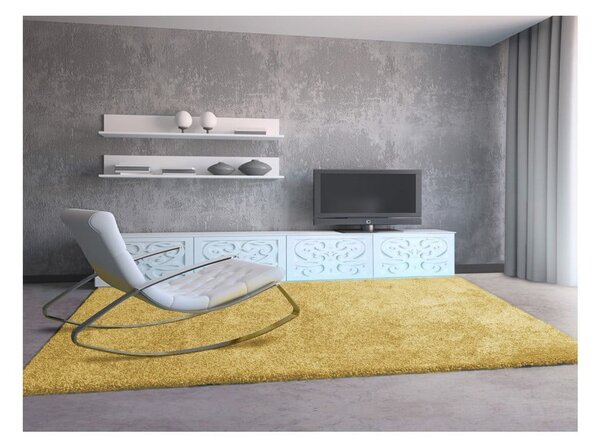 Žlutý koberec Universal Aqua Liso, 57 x 110 cm