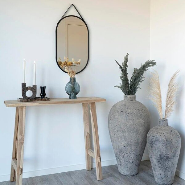 Nordic Living Černé kovové závěsné zrcadlo Trapade 60 x 35 cm