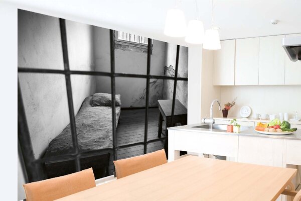DIMEX | Vliesová fototapeta Postel uvnitř cely MS-5-0959 | 375 x 250 cm| bílá, šedá