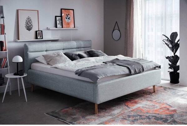 Šedomodrá čalouněná dvoulůžková postel s úložným prostorem s roštem 180x200 cm Lotte – Meise Möbel