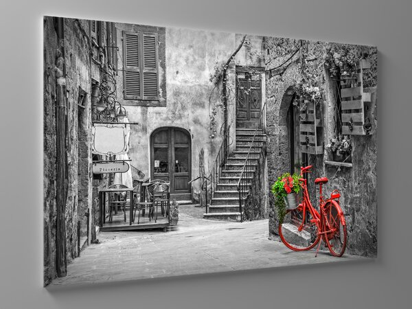 Liox Obraz červené kolo v uličce Rozměr: 100 x 65 cm