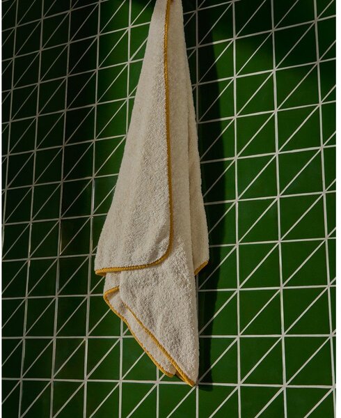 Žlutá/bílá froté bavlněná osuška 70x140 cm Sedora – Kave Home