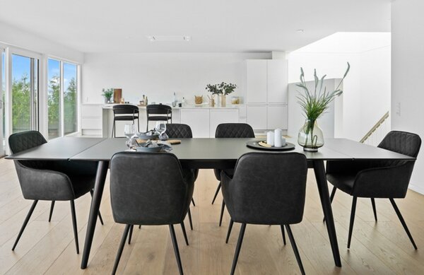 Nordic Living Tmavě šedá koženková jídelní židle Malvik
