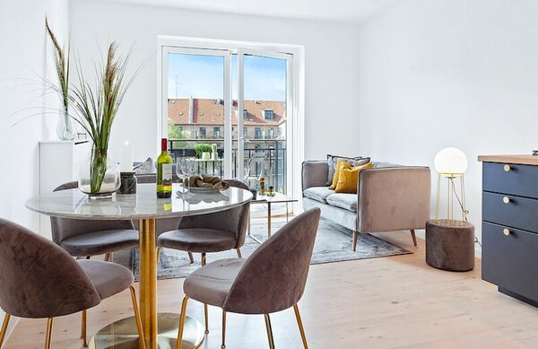 Nordic Living Bílý kulatý jídelní stůl Ascona 110 cm