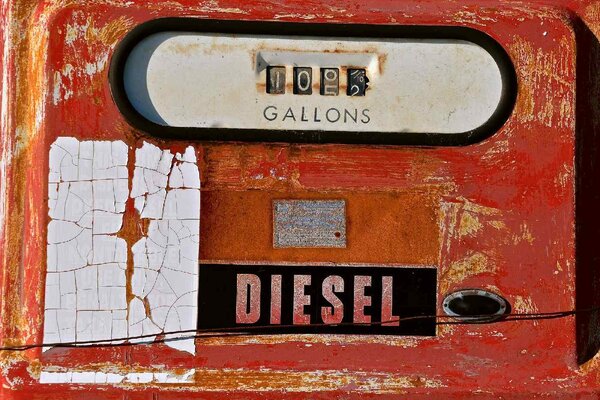 DIMEX | Vliesová fototapeta Staré dieselové čerpadlo MS-5-2106 | 375 x 250 cm| červená, bílá, černá