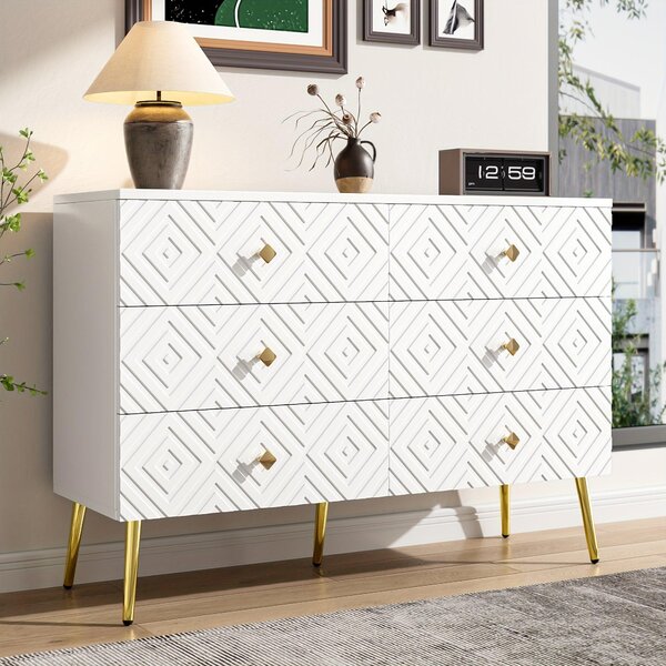 Moderní komoda se šesti zásuvkami, rozměry 120x40x80 cm, v elegantní bílé barvě s zlatými detaily