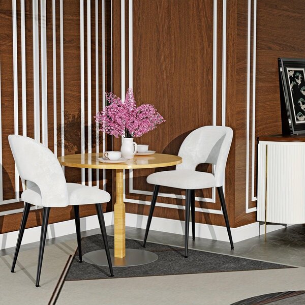 Sada dvou jídelních židlí ve stylu art deco s kovovou konstrukcí a ergonomickým designem