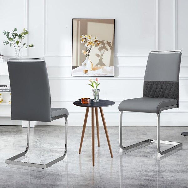 Kompletní sada dvou pohodlných šedých jídelních židlí v moderním stylu