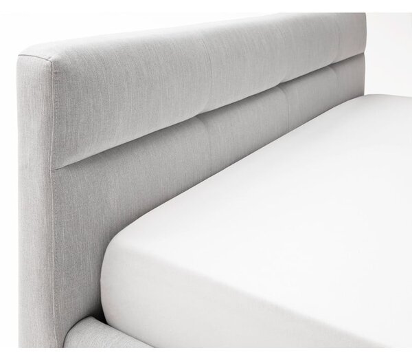 Světle šedá čalouněná dvoulůžková postel s úložným prostorem s roštem 160x200 cm Lotte – Meise Möbel
