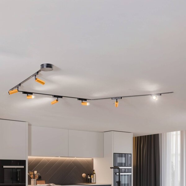 Lindby Lumaro track system, reflektory, 7 světel, zlaté, Ø4cm,48V,stmívatelné, stmívatelný, Černá, Obývací pokoj / jídelna, Hliník, Moderní