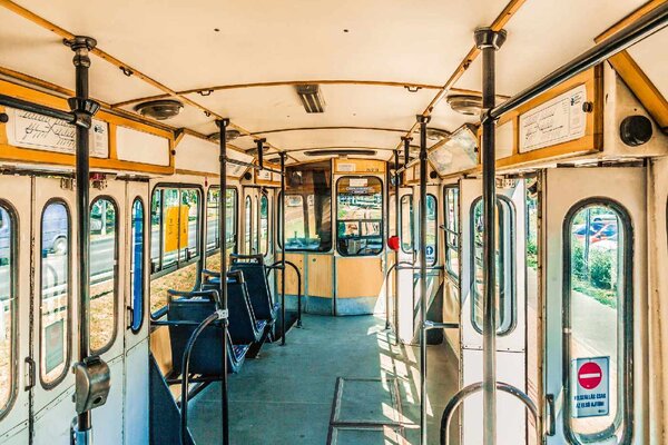 DIMEX | Vliesová fototapeta Interiér retro tramvaje MS-5-2918 | 375 x 250 cm | modrá, béžová, žlutá