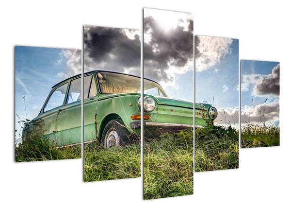 Obraz zeleného auta v trávě (150x105cm)
