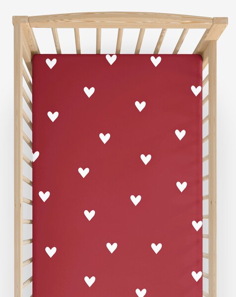 Goldea vánoční bavlněné napínací prostěradlo do dětské postýlky - bílá srdíčka na červené 60 x 120 cm