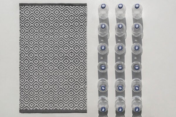 Béžová textilní koupelnová předložka 50x80 cm Shaki – Wenko