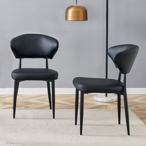 Černá minimalistická ergonomická jídelní židle s prohnutým opěradlem, komfortní design, nabízí zážitek z posezení plný pohodlí a jednoduchosti. Balení obsahuje 2 židle. Černá barva