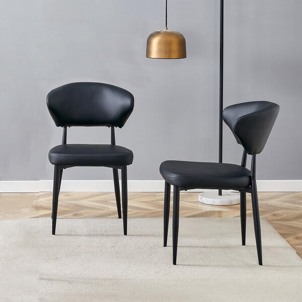 Černá minimalistická ergonomická jídelní židle s prohnutým opěradlem, komfortní design, nabízí zážitek z posezení plný pohodlí a jednoduchosti. Balení obsahuje 2 židle. Černá barva