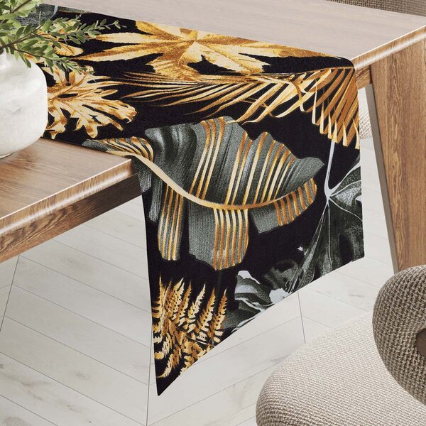 Biante Bavlněný běhoun na stůl Sandra SA-389 Šedozelené a zlaté tropické listy na černém 20x120 cm