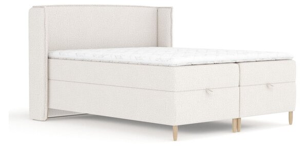 Krémová boxspring postel s úložným prostorem 180x200 cm Monpelli – Maison de Rêve