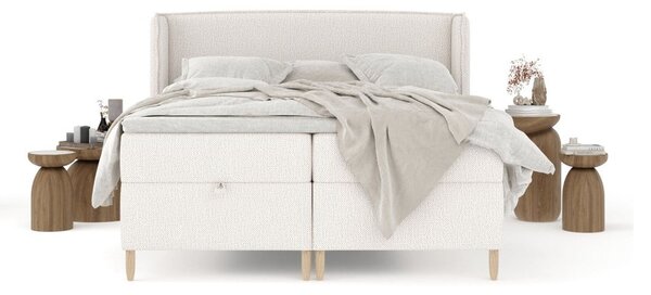 Krémová boxspring postel s úložným prostorem 180x200 cm Monpelli – Maison de Rêve