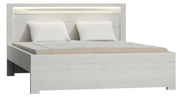 Manželská postel z bílého jasanu s výraznou reliéfní kresbou TK210