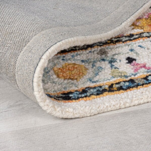 Žlutý vlněný koberec 170x120 cm Dahlia - Flair Rugs
