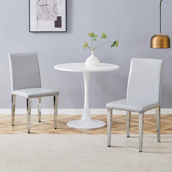 Sada dvou jídelních židlí, minimalistický design, potažené umělou kůží (PU), strukturovaný povrch, kovové nohy (světle šedá, stříbrná)
