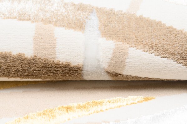 Makro Abra Kusový koberec GOLDEN NA44C Listy krémový Rozměr: 140x200 cm