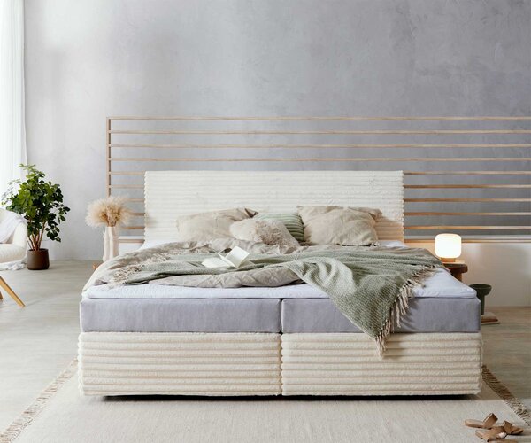 DELIFE Boxspring postel Dream-Well plyšový manšestr béžová 200x200 cm s taštičkovou pružinovou matrací a visco topperem