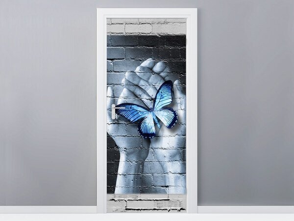 Fototapeta na dveře Modrý motýl na dlaních Materiál: Samolepící, Rozměry: 95 x 205 cm