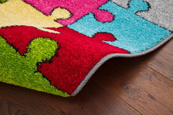 Dětský koberec Agnella Funky Top Super Puzzle vícebarevný Rozměr: 100x170 cm