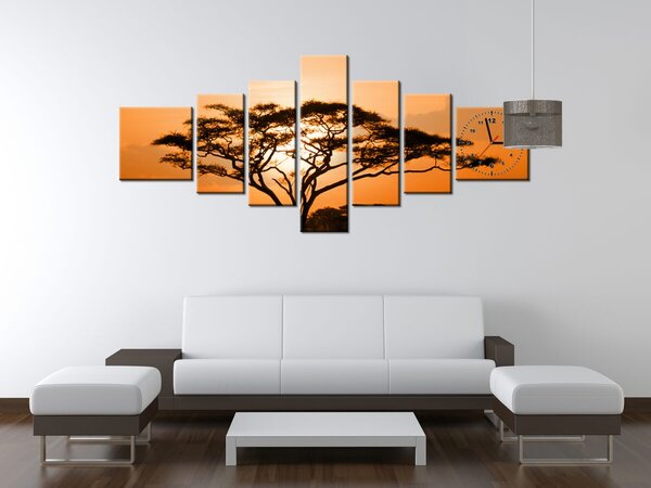 Obraz s hodinami Nádherná africká země - 7 dílný Rozměry: 160 x 70 cm