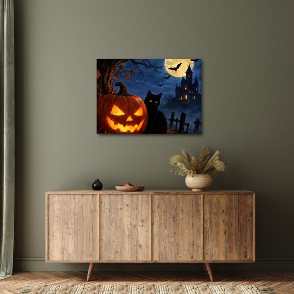 Obraz - Černá kočka u svítící dýně na Halloween (70x50 cm)