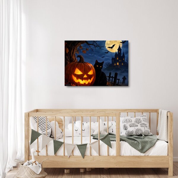 Skleněný obraz - Černá kočka u svítící dýně na Halloween (70x50 cm)