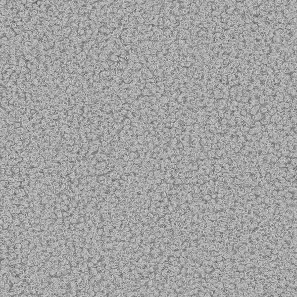 Světle šedé křeslo z textilie bouclé Chuck – Micadoni Home