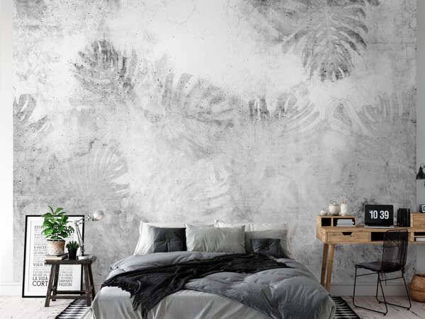 Fototapeta Monstera - krajina v šedých odstínech s listy a betonovou texturou