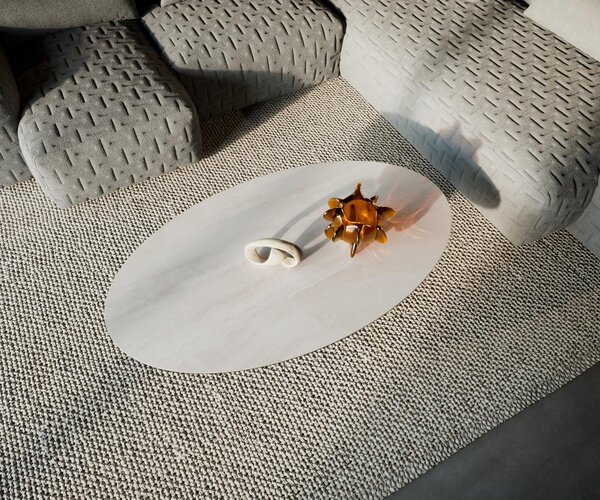 DELIFE Konferenční stolek Edge oválný 135×80 cm keramika onyx champagne Vibany kov černá